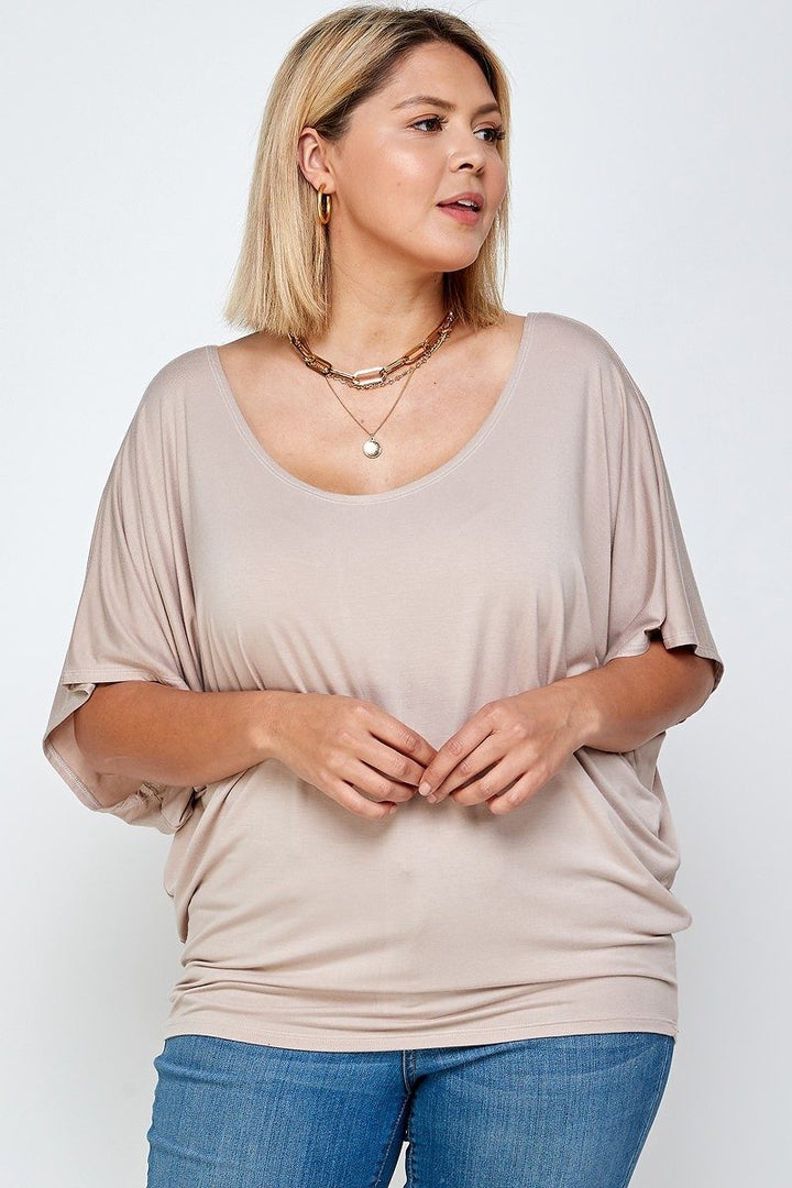 Solid Knit Top With A Flowy Silhouette in Sand