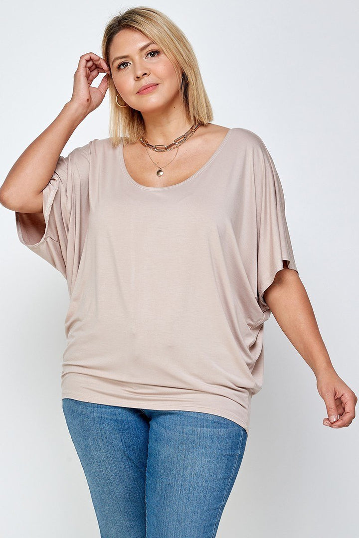 Solid Knit Top With A Flowy Silhouette in Sand