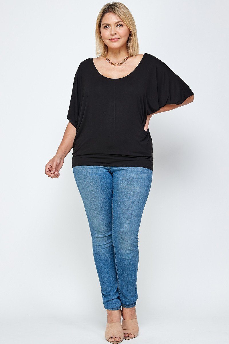 Solid Knit Top With A Flowy Silhouette in Black