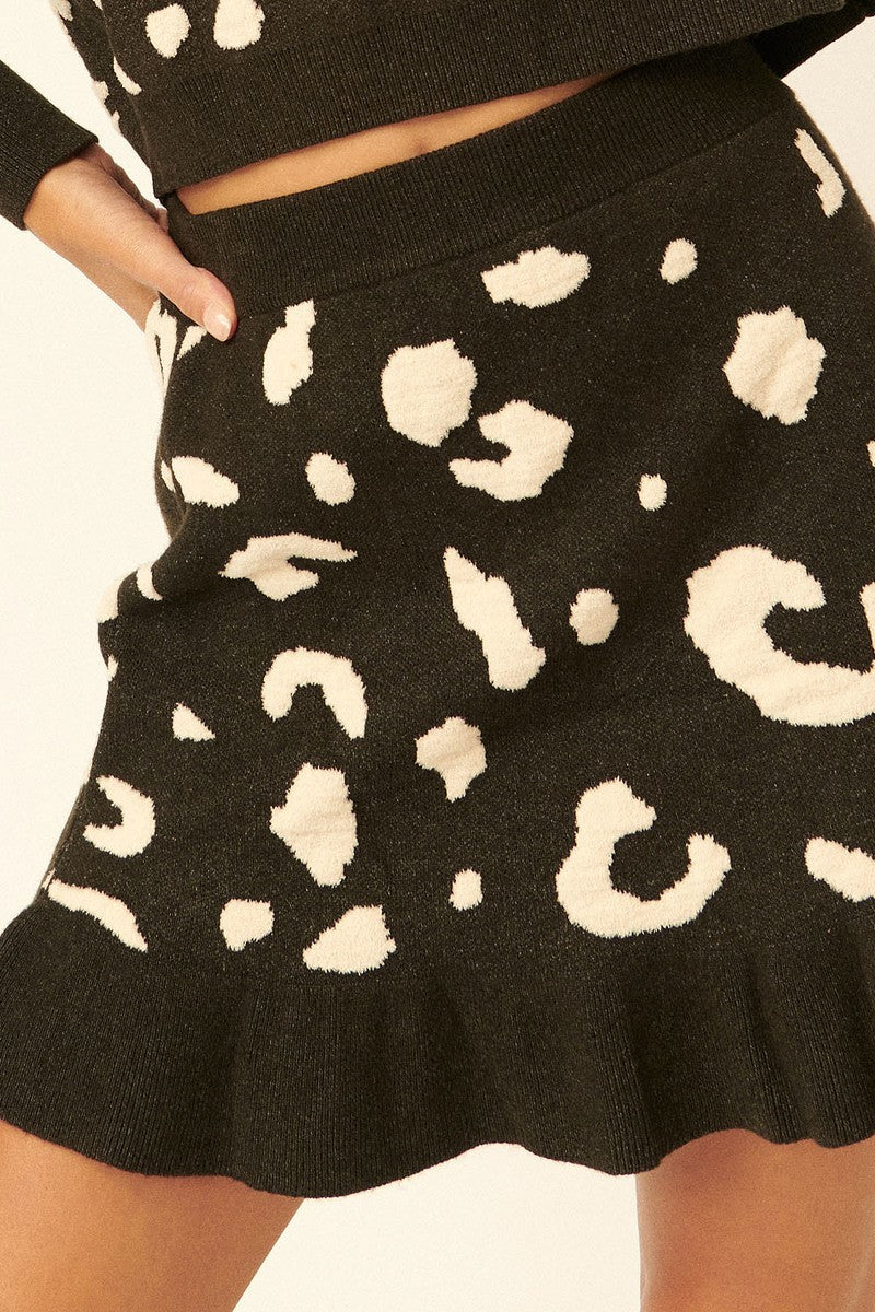 A Leopard-print Knit Mini Skirt in Black