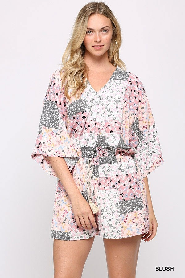 Patchwork Printed Surplice Romper With Waist Tassel Tie And Bottom Lining in Blush